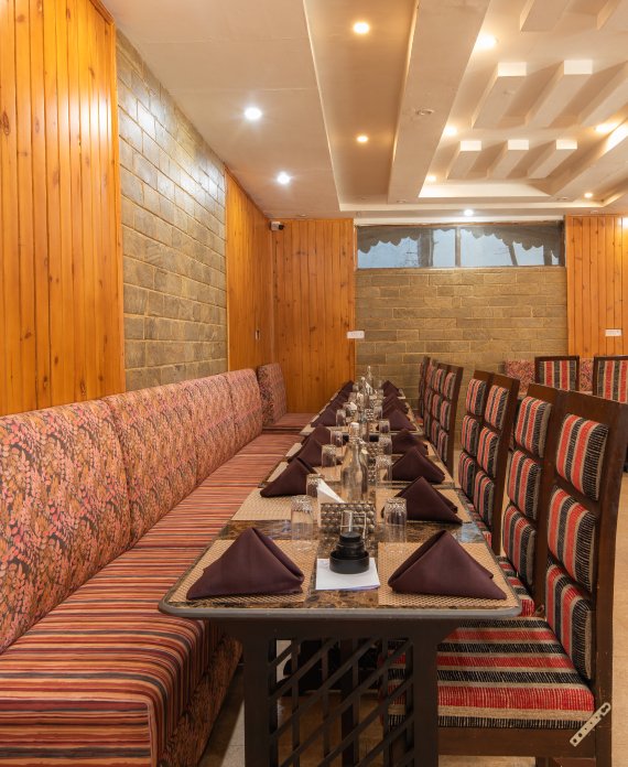 Handcrafted meals and outdoor dining at Ojaswi Resort, the best restaurant in Mukteshwar for corporate groups and team lunches.