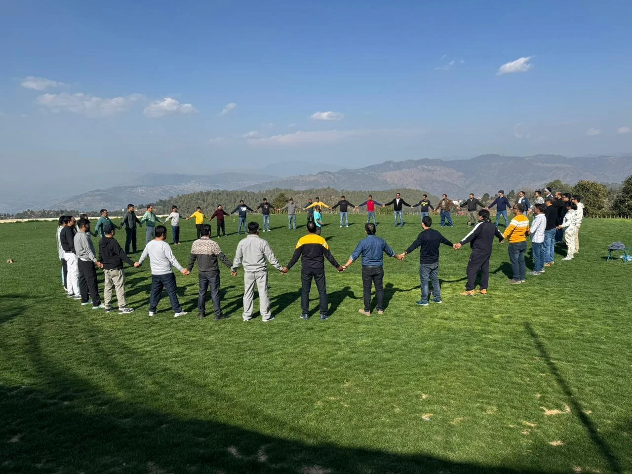 Team building games on the lawn at Ojaswi Himalayan Resort, a corporate offsite venue in Uttarakhand