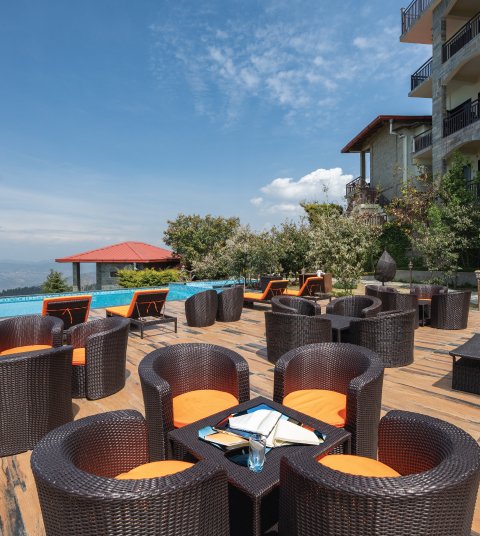 Corporate conference room with panoramic Himalayan views at Ojaswi Resort Mukteshwar, ideal for MICE and executive meetings.