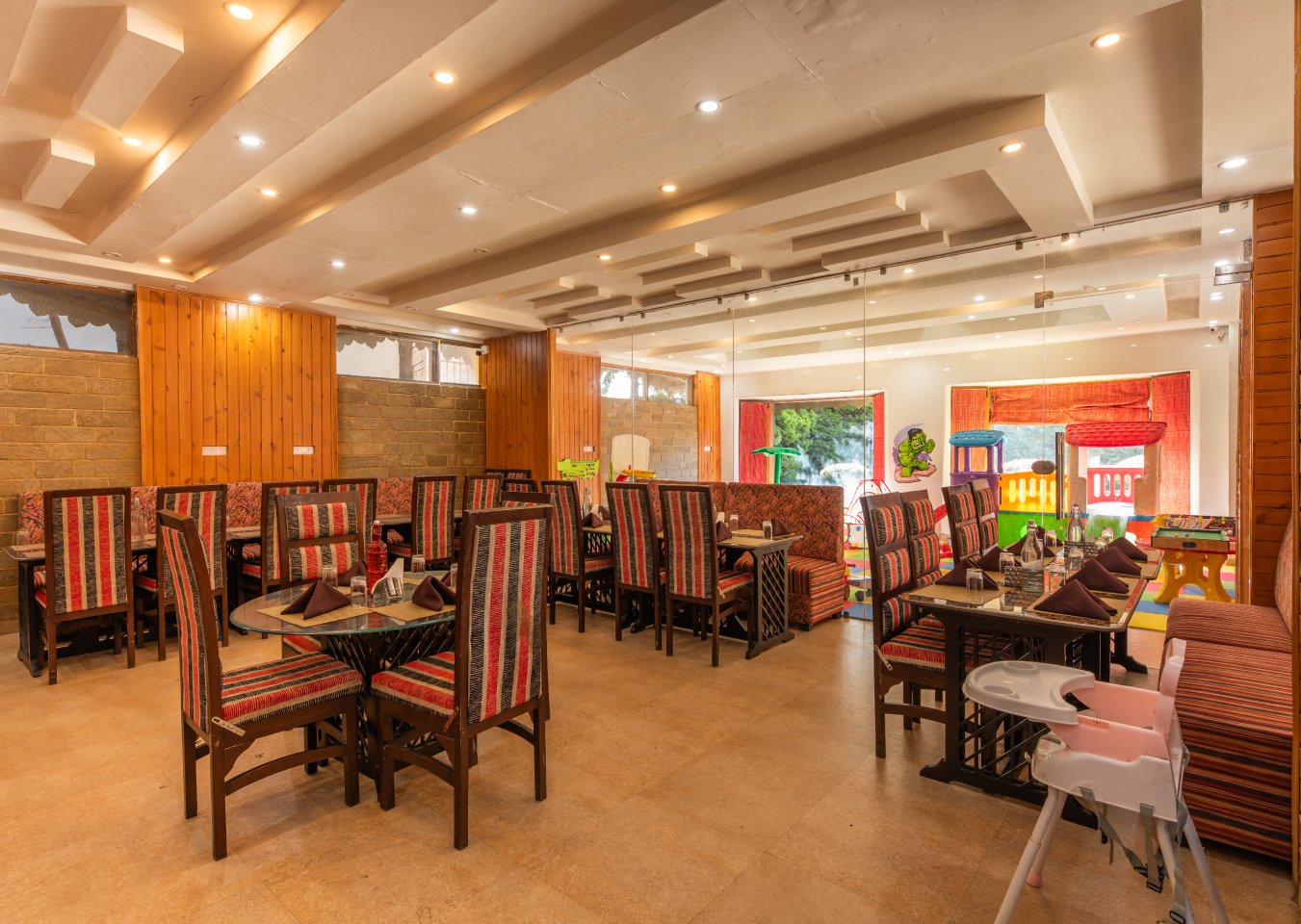 Experience fine dining at Ojaswi Resort’s restaurant in Mukteshwar, featuring panoramic Himalayan valley views.