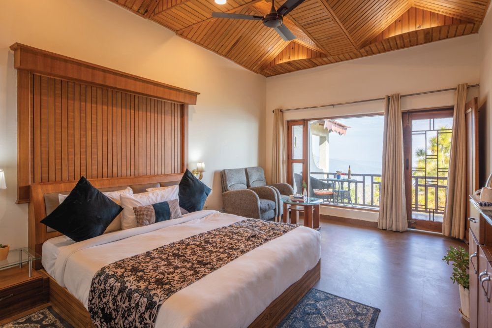 Terrace Room at Ojaswi Resort Mukteshwar, ideal for families and group travelers with spacious layout and mountain views.