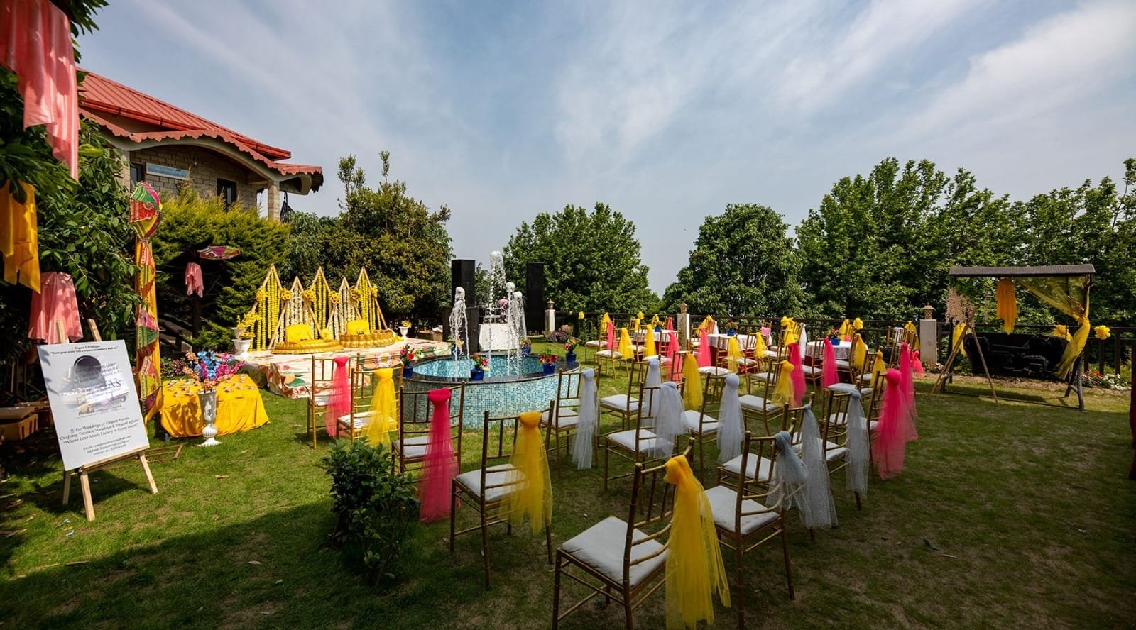 Spacious wedding lawn at Ojaswi Resort with a lush forest backdrop, ideal for grand Himalayan destination weddings.