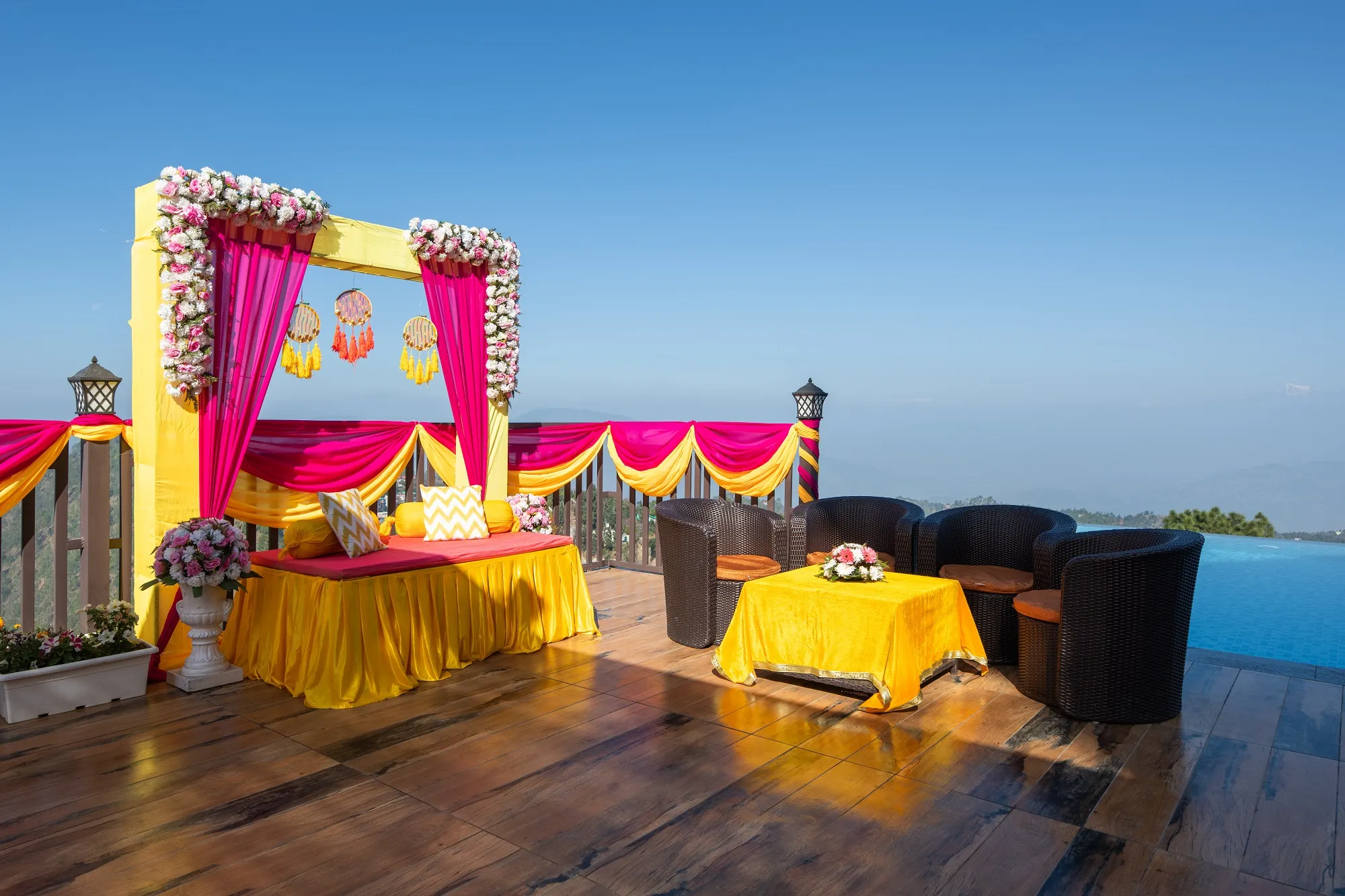 Beautiful Haldi ceremony setup with scenic mountain views in the background at Ojaswi Resort